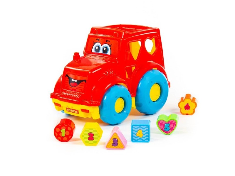 Развивающая игрушка "Трактор" в сеточке