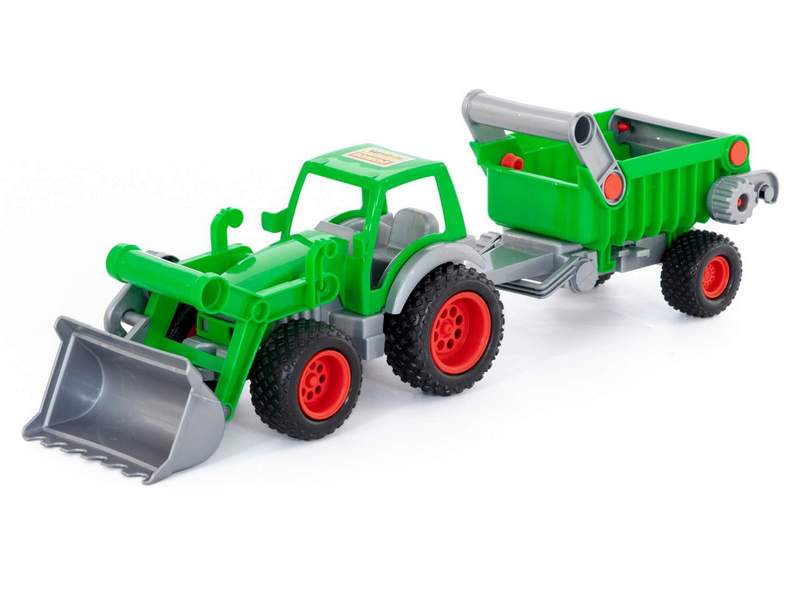 Трактор-погрузчик "Фермер-техник" с полуприцепом в сеточке